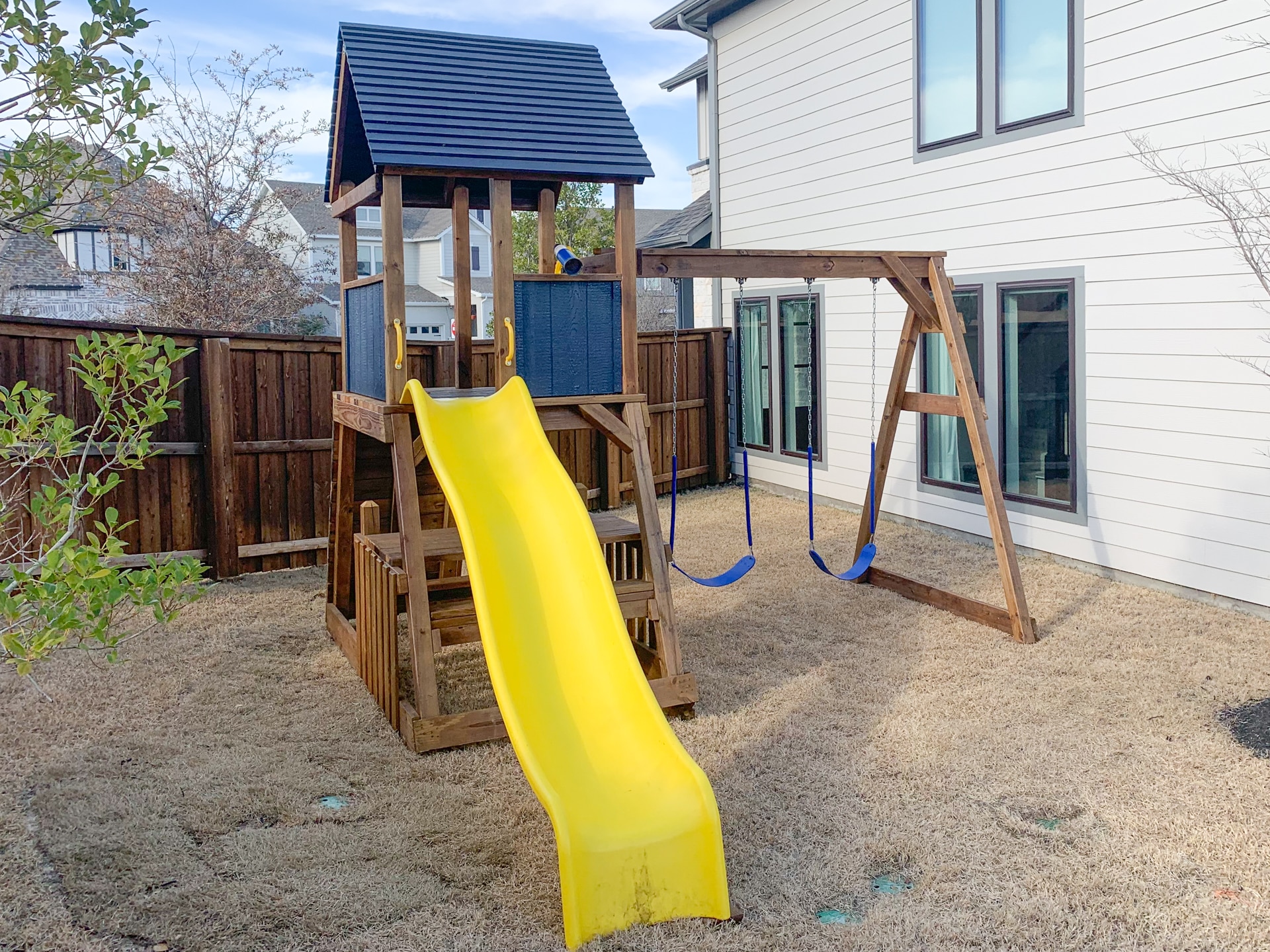 Watch Tower playset installed in a family backyard