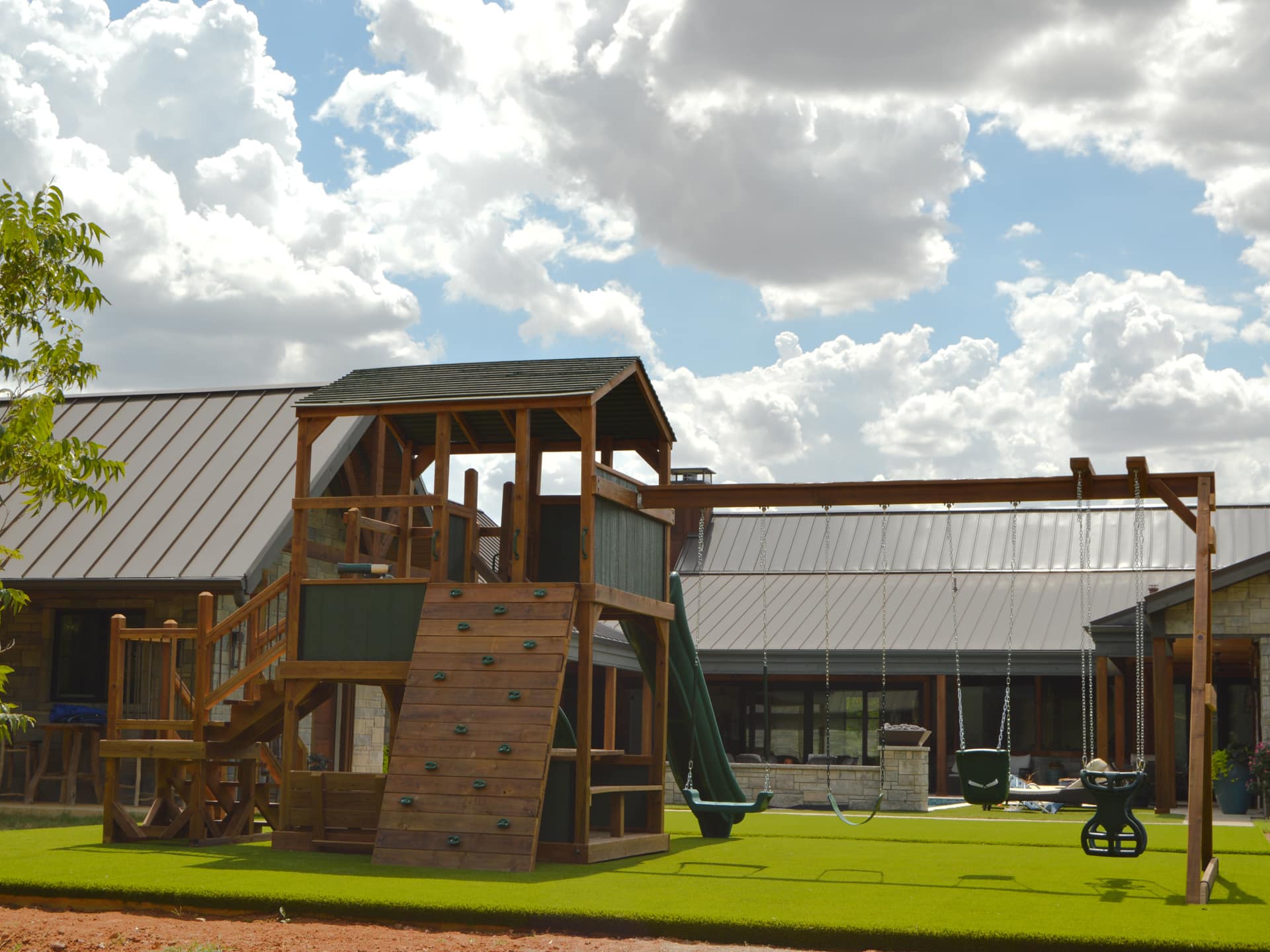 Family Tower backyard playset installed in a sunny Texas yard